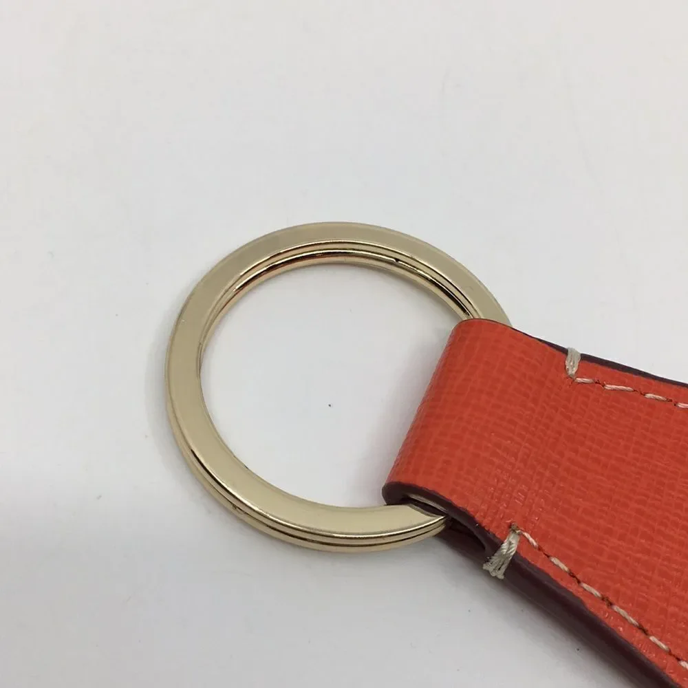 Dooney & Bourke Orange Leather and Gold Tone Keychain Key Fob